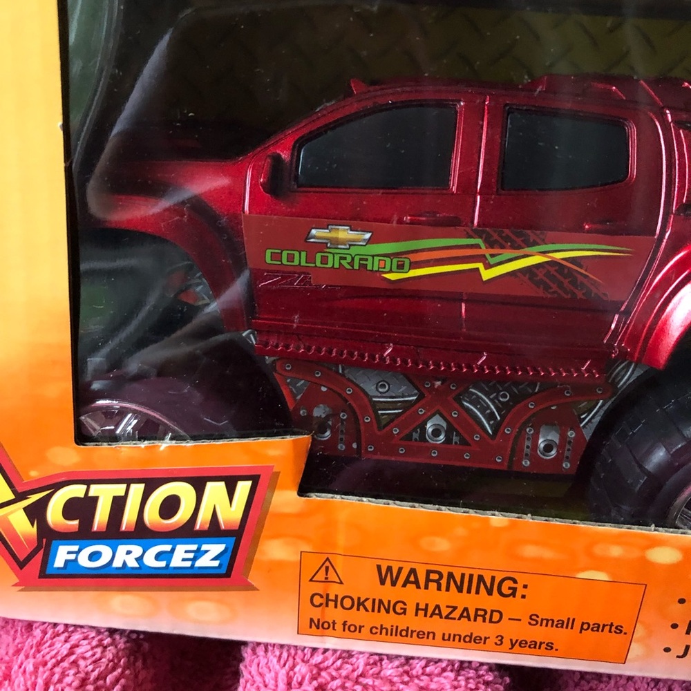 Action truck new in box,John Deere truck gently used